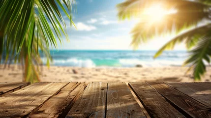 Fotobehang Afdaling naar het strand Inviting tropical beach view through palm leaves from the perspective of a rustic wooden boardwalk under the sunlight.
