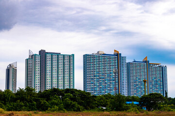 Highrise buildings skyscrapers streets city cityscape in Pattaya Thailand.