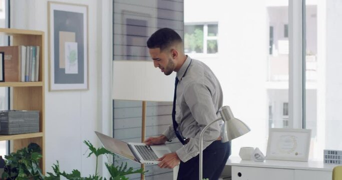Frustrated businessman, office and smashing laptop in destruction, damage or anger management. Angry man or employee throwing computer or stomping on floor for broken or faulty equipment at workplace