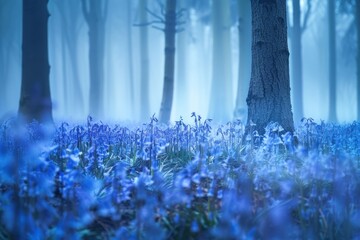 Ethereal forest floor covered in wild bluebells with soft morning mist weaving through the trees creating a magical and dreamy woodland scene