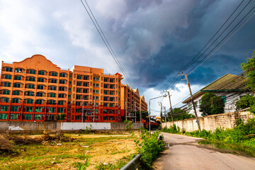 Dark storm clouds the tropical monsoon rain is coming Thailand.