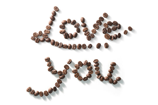 coffee bean lettering close-up top view on white background. brown arabica coffee beans