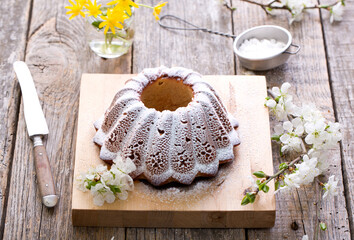 Easter cake on a wooden background.