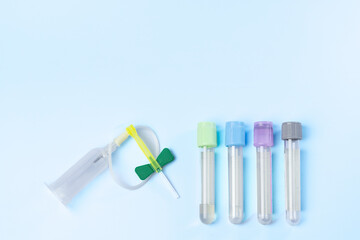 syringe for injectable medication on blue background