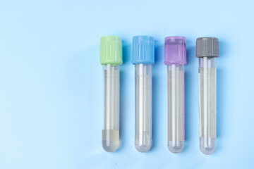 syringe for injectable medication on blue background