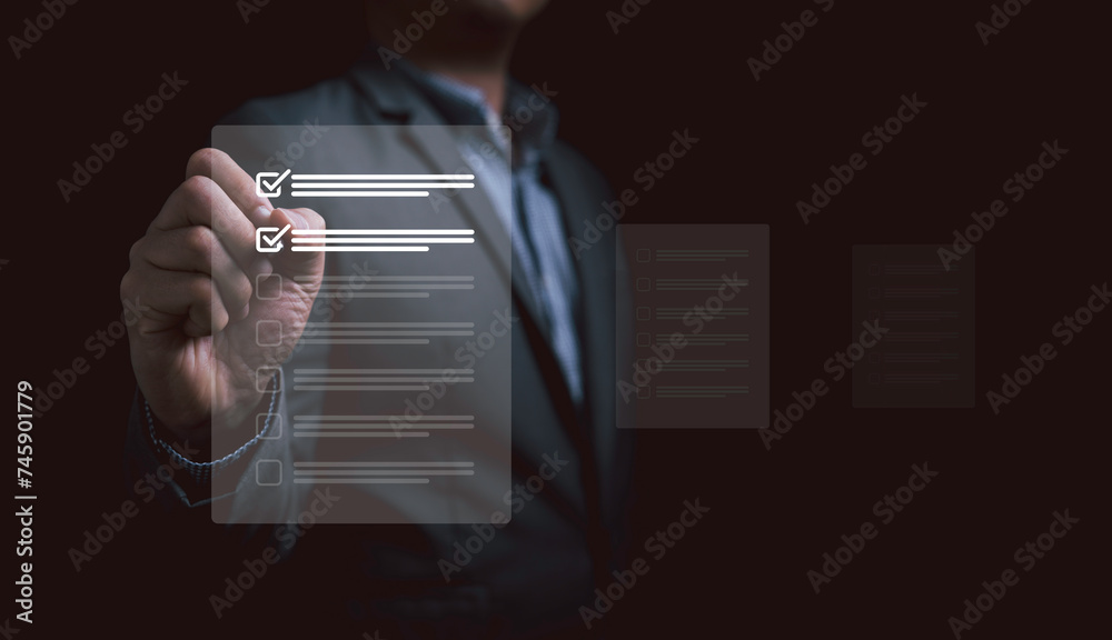 Fototapete Businessman tick correct sign mark on virtual checklist for confirm ISO document for quality audit and document approve concept.