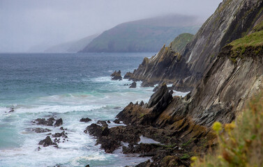 Typical Irish rocks in the Coumeenoole beach in the Dingle Peninsula, Slea Head Drive, Ireland
