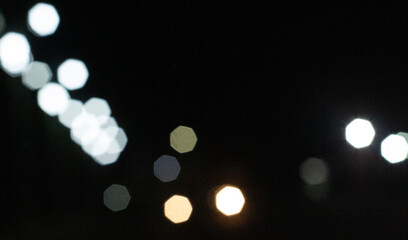 Bokeh blurred lights with dark night background