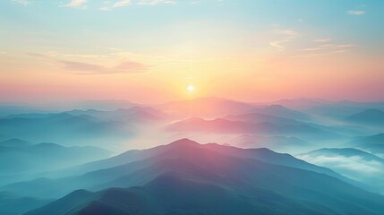 Serene Mountain Sunset: Ethereal Haze and Warm Light Blending Ridges from Blues to Oranges