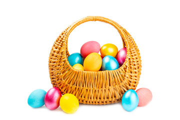 Fototapeta na wymiar Easter basket filled with colorful eggs isolated on white background. Easter celebration concept. Colorful easter handmade decorated Easter eggs.