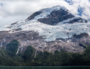 Majestic Glacier Overlooking a Calm Alpine Lake
