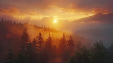 Majestic Mountain Sunrise: Ablaze Sky Casting Radiant Glow Over Dense, Mist-Enveloped Forest - obrazy, fototapety, plakaty