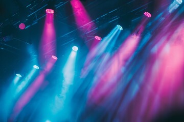 Colorful stage lights at a concert.
