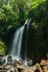 This unspoiled seasonal waterfall in the middle of the wilderness is called the Grenjengan Kembar waterfall. Detailed photos of the waterfall using a slow shutter speed technique