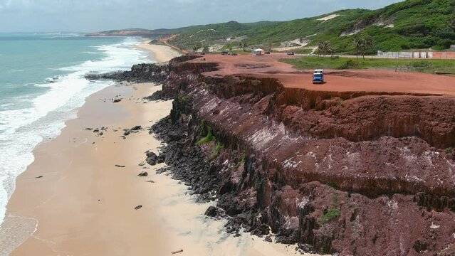 Praia da Pipa (Praia de Pipa), Brazil. Dune buggy is the best way to explore the massive sand dunes, cliffs,  and long beaches in Pipa Beach.