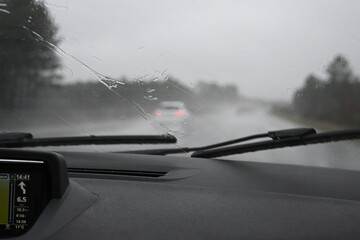 interior of a car driving in the rain