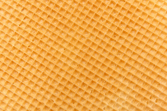 Waffle texture close up. Wafer sheet. homemade baking