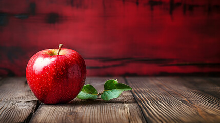 red apple on wooden table - Powered by Adobe