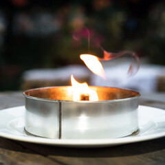 Burning decorative candle