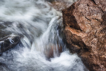 water flowing over rocks