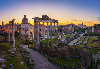 Fototapeta na wymiar Sunrise with panoramic view of the skyline of the Roman Forum in Rome, Italy