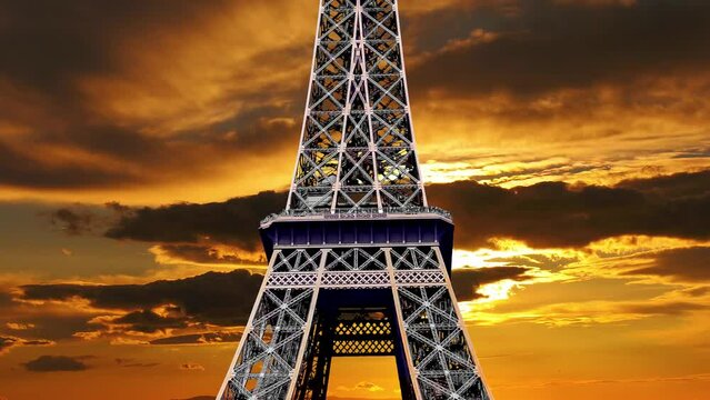 Eiffel Tower in Paris, France (against the background of the sunset, 4K, time lapse)   