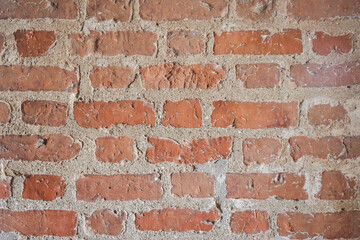 Naklejka premium Red brown old brick wall background grunge texture.