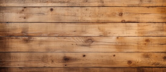 A weathered wooden wall with a brown stain, showcasing the aged texture and rustic charm of the maple wood. The light brightens the surface, highlighting the unique character of the material.