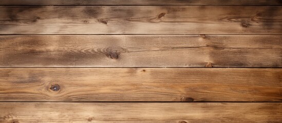 Fototapeta premium A detailed view of a wooden plank wall, showcasing the texture and natural grain patterns of the wood. The individual planks are closely aligned, creating a cohesive and structured appearance.