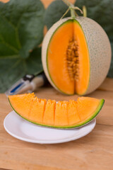 piece of fresh orange melon on the plate