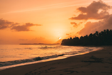 Naklejka na ściany i meble sunset sunrise in the caribbean beach