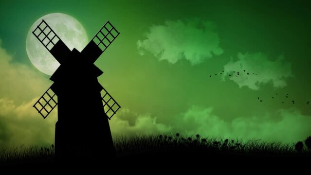 Windmill Silhouette at Dusk Landscape 4K Loop features a silhouette of a windmill in a grassy field with a full moon in the sky and birds flying in the background in a loop.