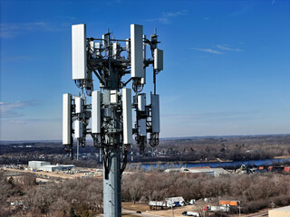 Cell phone antenna array mounted on top of a monopole tower