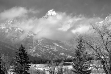 The Grand Teton poking through the clouds; Grand Teton NP; Wyoming