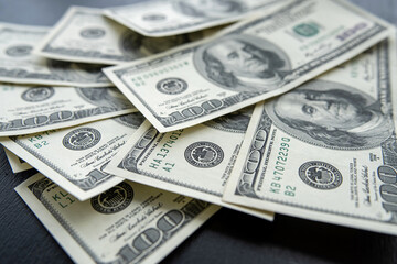  stack of 100 US dollars paper banknotes as finance background