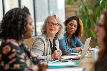 Successful collaboration Multigenerational team of women at a productive business meeting