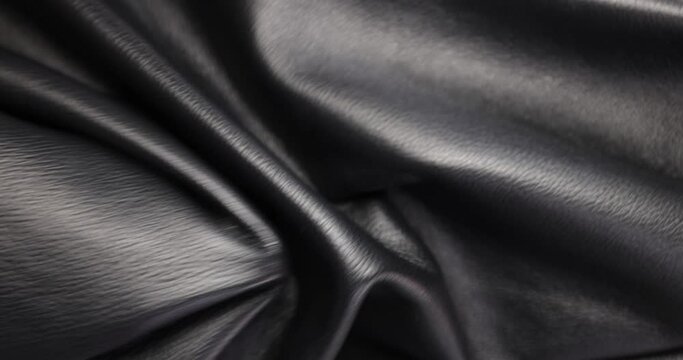 Wrinkles of natural leather. Check quality and testing of natural soft leather, material for craft and hobbies accessories, macro.
