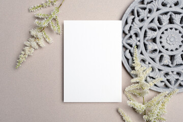 Wedding invitation or greeting card mockup with botanical decor