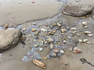 Oil slick on beach