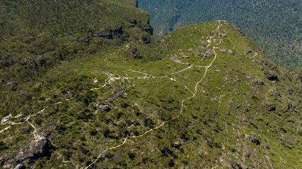 Drone aerial photograph of dirt walking tracks that get you to lookouts in the Grose Valley in the Blue Mountains in New South Wales in Australia