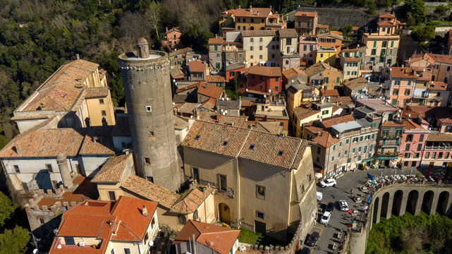 Aerial view of Nemi, a town and comune in the Metropolitan City of Rome, Italy. It is located in the Alban Hills. The historic center is included in the Castelli Romani regional park.