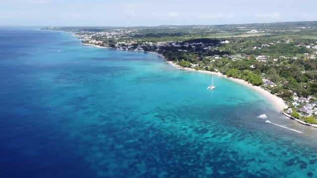 Epic aerial slow-motion of Barbados country with the blue seaside and bright cloudy sky