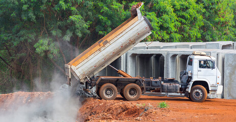 Truck dumping rubble