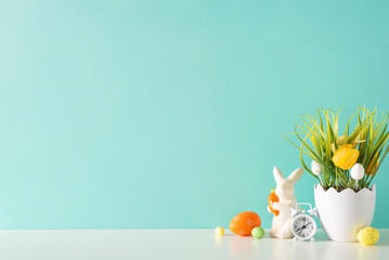 Easter interior concept: Side view of a tabletop showcasing a shell-shaped flowerpot with grass and tulips, carrots for Easter bunny, colorful eggs, and an alarm clock on a pastel teal wall background