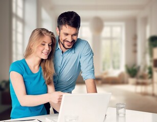 Young couple do household budget.