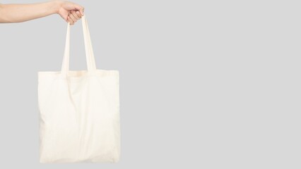 White Stylish Blank Tote Bag Mockup Isolated on White Background. Customizable Canvas Fashion Template
