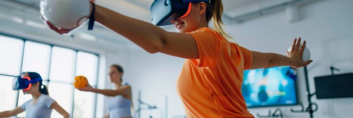 Woman doing VR boxing in a gym - A woman in orange t-shirt is simulating boxing in a workout space with VR gear, illustrating fitness and technology blend