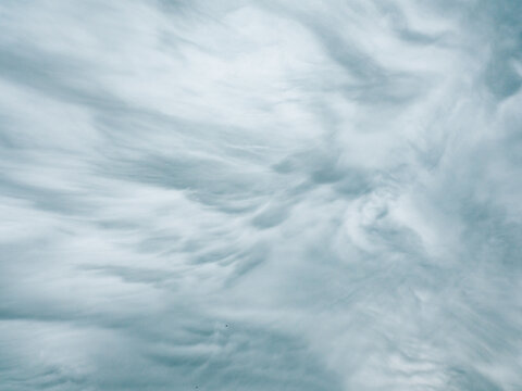 Ethereal blue cloud texture for serene spring backgrounds