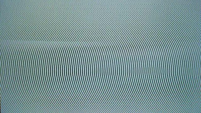 The analog TV screen, with its characteristic scan lines and imperfect