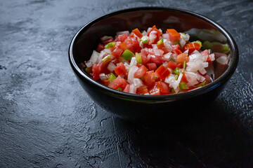 Typical Argentine Creole sauce. Made with bell peppers, tomato, onion, vinegar and oil.